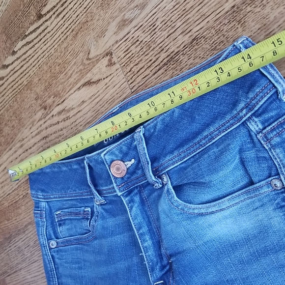 (4) American Eagle Super Stretch Kick Boot Short Jeans - Picture 7 of 13